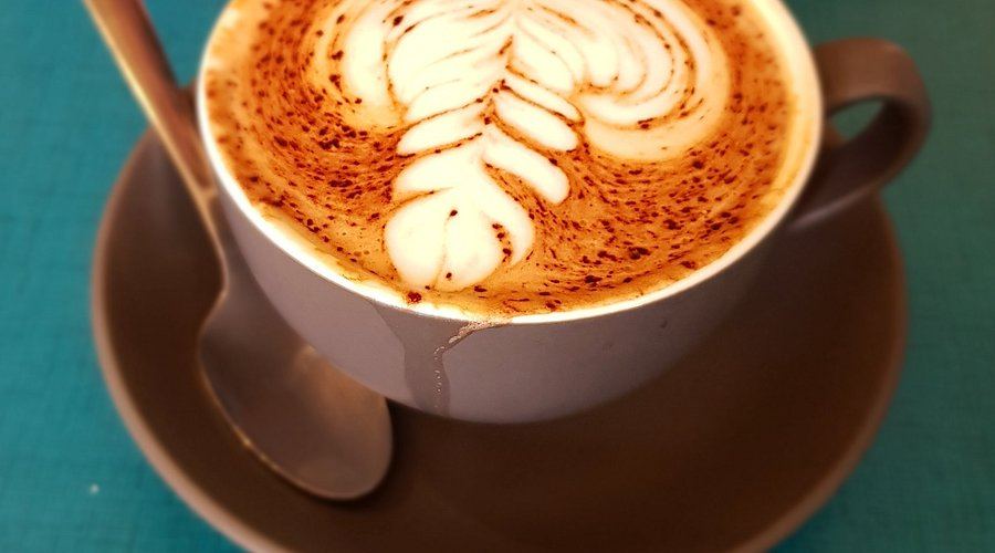 A rosetta poured into a cappuccino cup at Dahab Cafe