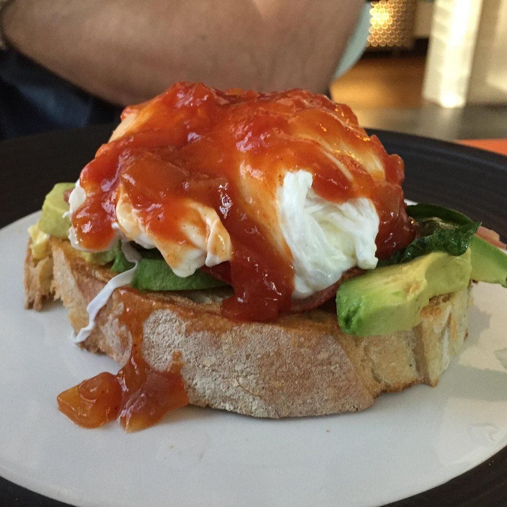 Poached egg on toast with chilli jam